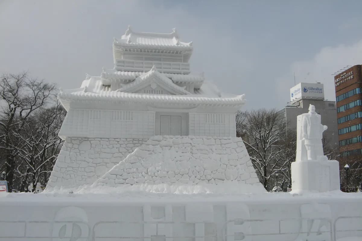 A large snow sculpture of a Japanese castle in Odori Park at the Sapporo Snow Festival